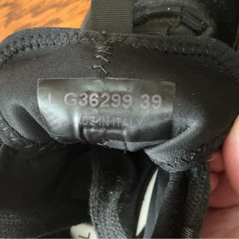CHANEL Black Women’s Sneakers with Gold Logo